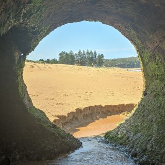 Beach Framed By Drain, Mona Vale