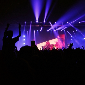 BABYMETAL, Hordern Pavilion, Moore Park, with a packed crowd and one girl on shoulders of another in front of purple-lit stage and BABYMETAL singers front and centre